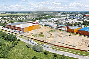 Panoramic aerial view of distribution center at industrial logistic zone. drone photo