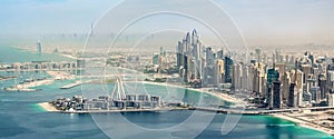 Panoramic aerial view of Dubai Marina skyline with Dubai Eye ferris wheel United Arab Emirates