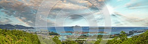 Panoramic aerial view of Eden Island and Mahe seascape from the hill at sunset, Seychelles