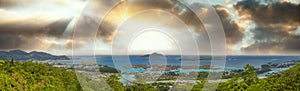 Panoramic aerial view of Eden Island and Mahe seascape from the hill at sunset, Seychelles