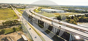 Panoramic aerial view elevated expressway through water zone and construction site