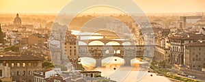 Panoramic aerial view of Florence at sunset with the Ponte Vecchio and the Arno river, Tuscany Italy