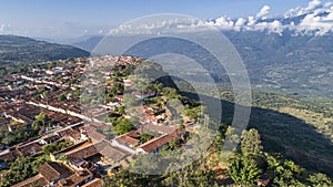 Panoramic aerial view of historic town Barichara, Colombia at a cliff edge with shadow