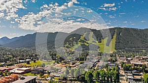 Panoramic aerial view of Jackson Hole homes and beautiful mountains on a summer morning, Wyoming