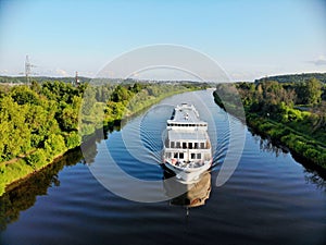 Panoramic aerial view of the landscape cruise ship sailing on water