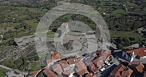 Panoramic aerial view at the Linhares da Beira Castle and Linhares da Beira village downtown, Serra da Estrela mountains on