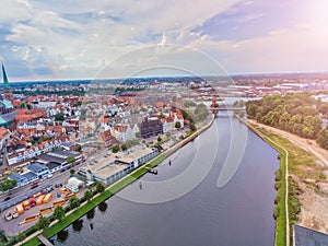 Panoramic aerial view of Lubeck cityscape on a cloudy day, Germany