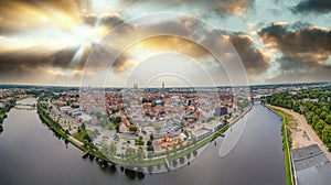 Panoramic aerial view of Lubeck cityscape on a cloudy day, Germany