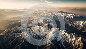 Panoramic aerial view of majestic mountain range in winter sunset generated by AI