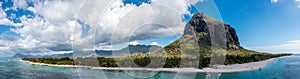 Panoramic aerial view of Mauritius island with famous Le Morne Brabant mountain, beautiful beach, blue lagoon and landscape.