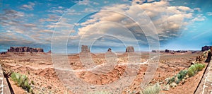 Panoramic aerial view of Monument Valley landscape at sunset, Ar