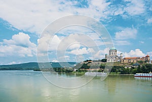 Panoramic aerial view over Danube river to of Esztergom Cathedral Basilica over the hill.
