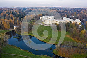 Panoramic aerial view of the Pavlovsk Park and the Pavlovsk Palace on an autumn evening.Bright autumn landscape, Slavyanka river.