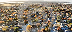 Panoramic aerial view subdivision with colorful fall foliage in Flower Mound, Texas, USA