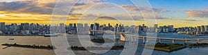 Panoramic Aerial view of Tokyo skylines with Rainbow bridge and tokyo tower over Tokyo bay