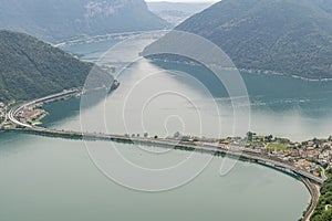 Panoramic aerial view from the top of San Salvatore mountain on Lake Lugano and surroundings, Switzerland