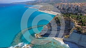 Panoramic aerial view of Tropea coastline and beaches in summer, Calabria - Italy