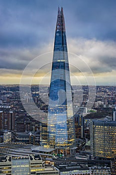 Panoramic aerial view of urban London. Centered the Shard skyscraper in London, United Kingdom