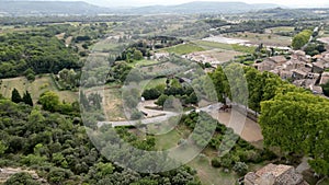 Panoramic Aerial View of Vaugines Boulodrome: A Drone's Journey Over Ancient and New Forests in Provence, PACA