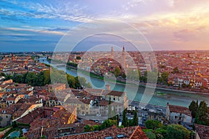 Panoramic aerial view of Verona, Italy at summer sunset, sun len