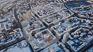 Panoramic aerial view of winter city Kyiv covered in snow