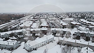 panoramic aerial view of a winter Naperville city with a private sector