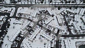 panoramic aerial view of a winter Naperville city with a private sector. Top drone shot