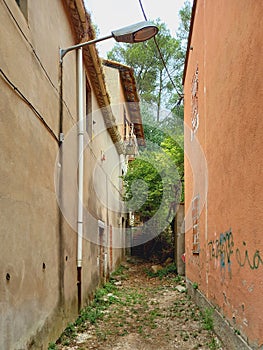 Panoramic of alley in old medieval town. Abandoned rural corner. Architecture and Medieval Constructions. Rural environment