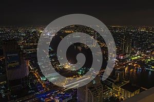 Panoramic areal view of Bangkok and Chao Phraya river at night