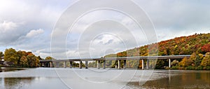 Panoramic autumn photo of the german autobahn bridge on the Seilersee lake in Iserlohn in the Sauerland, NRW