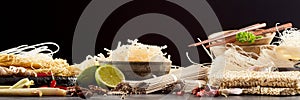 Panoramic banner with assortment of Asian noodles photo