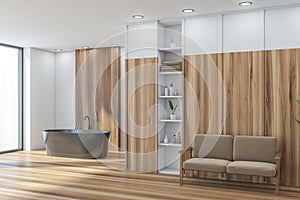 Panoramic bathroom corner: wooden coatings, dark beige bathtub, white walls