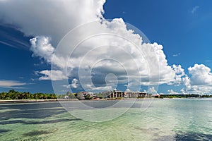 Panoramic beach view of Key West coast with dramatic cloudscape