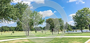 Panoramic beautiful green park with pathway trail in Coppell, Te