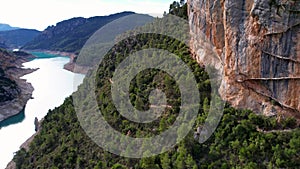 Panoramic beautiful vertiginous aerial view of wooden staircase at rock cliff as