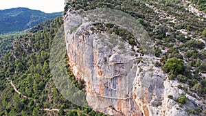 Panoramic beautiful vertiginous aerial view of wooden staircase at rock cliff as