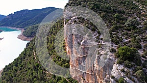 Panoramic beautiful vertiginous impressive aerial view from bottom to top of wooden staircase at rock cliff as part of