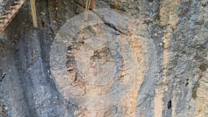 Panoramic beautiful vertiginous impressive aerial view from bottom to top of wooden staircase at rock cliff as part of