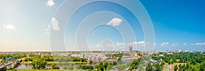 Panoramic bird view of Elbe river, old and new town, cathedral and city park in Magdeburg, Germany, summer, blue sky