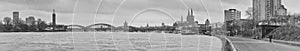 Panoramic black-and-white view of the city Cologne - the river Rhine and Hohenzollern Bridge with Cologne Cathedral