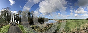 Panoramic from a bridge over a canal in a nature reserve