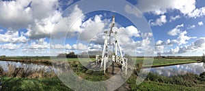 Panoramic from a bridge over a canal in a nature reserve around Wolvega