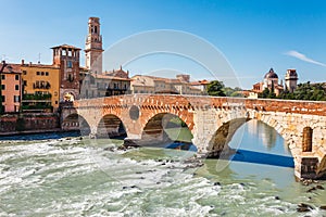 Panoramic cityscape aerial view on Verona historical center, bridge and Adige river. Famous travel destination in Italy. Old town