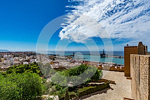 Panoramic cityscape of Almeria with the walls of Alcazaba (Castle)