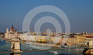 Panoramic cityscape of Budapest with Chain Bridge across Danube River and the Hungarian Parliament in Pest City, Hungary