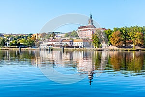 Panoramic cityscape of Litomerice reflected in Labe River, Czech Republic