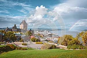 Panoramic Cityscape of Quebec in autumn. Sunny cloudy day, and rainbow over the river. Quebec, Canada