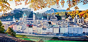 Panoramic cityscape of Salzburg, Old City, birthplace of famed composer Mozart. Colorful autumn scene of Eastern Alps. Nice morni