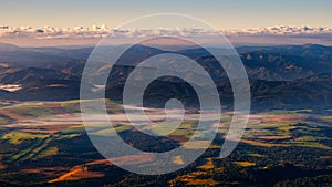 Panoramic colorful landscape of fields, meadows and mountains, High Tatras, Slovakia