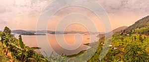 Panoramic crater lake view at sunset in the crater lake region in Uganda near Kibale.